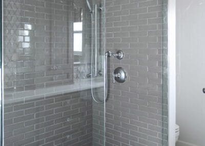 Lindin Design & Company | Spartanburg, SC | bathroom design, gray subway tile in shower with glass enclosure