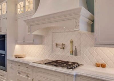 Lindin Design & Company | Spartanburg, SC | kitchen design with white cabinets, white marble countertops and pale blue walls