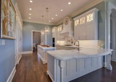 Lindin Design & Company | Spartanburg, SC | kitchen design with white cabinets, white marble countertops and pale blue walls