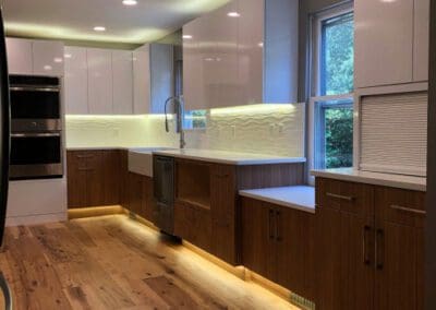 Lindin Design & Company | Spartanburg, SC | kitchen design with dark lower cabinets and light upper cabinets and lighting